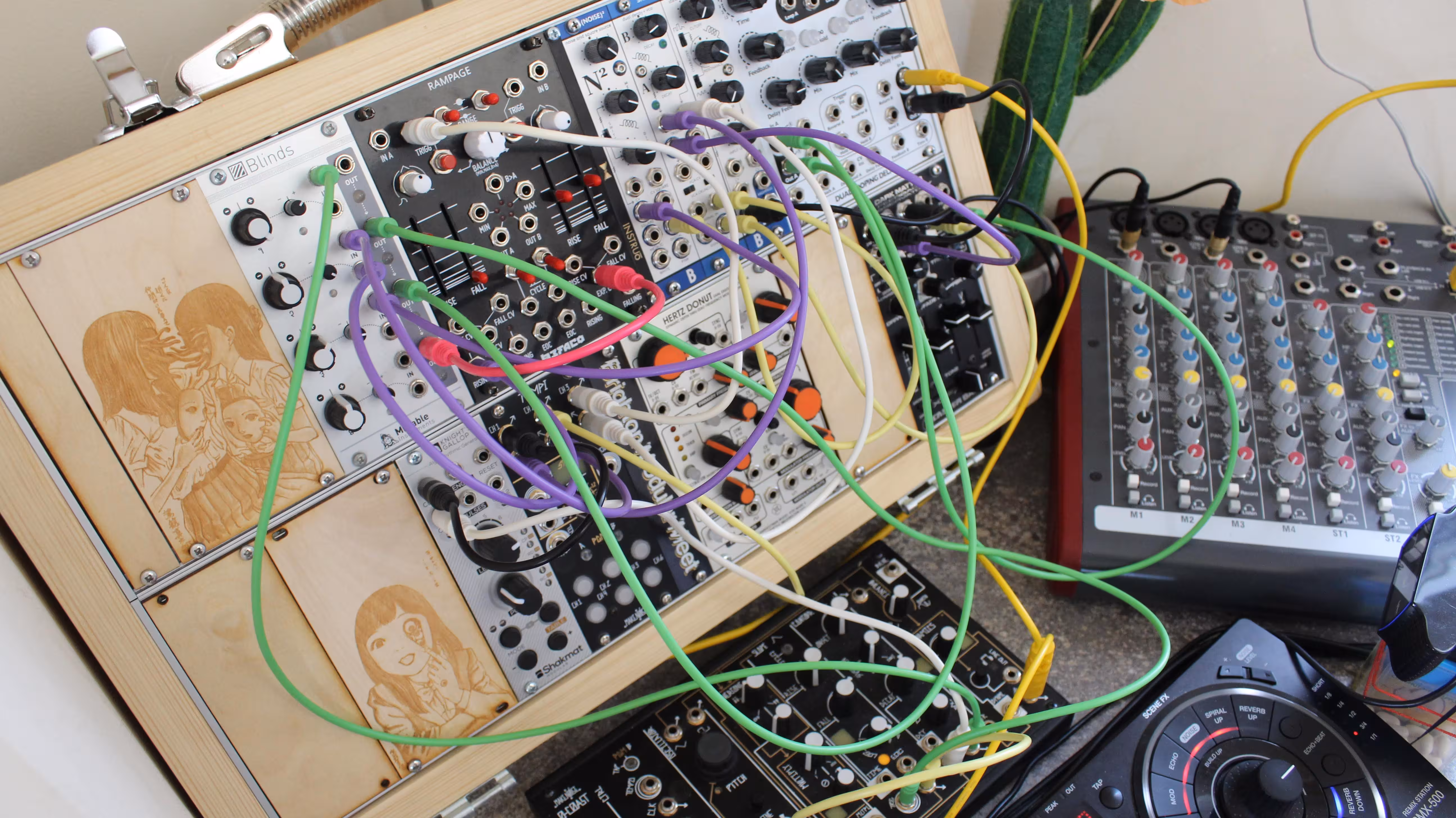 A modular synth connected with patch cables